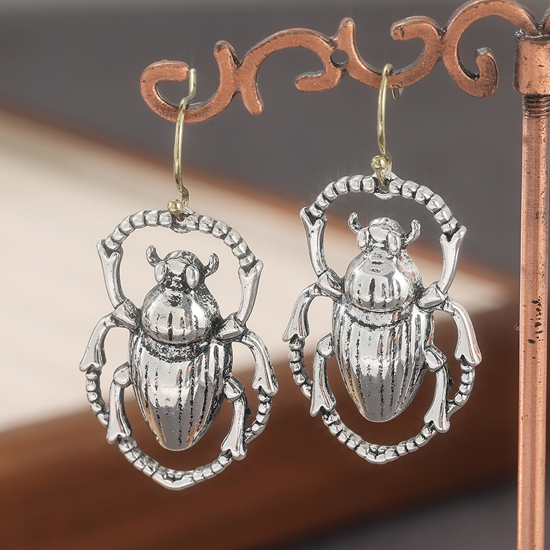 Handcrafted Brass Art Deco Drop Earrings with Scarab Detailing